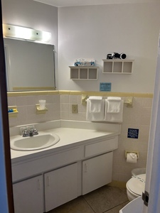 bathroom cabinet, counter, vanity
