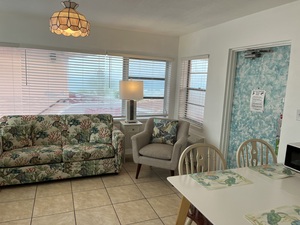 Room 34 Ocean View Living Room with Sofa and Chair