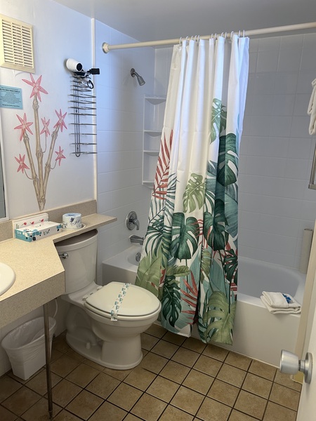Bathroom with tub and shower