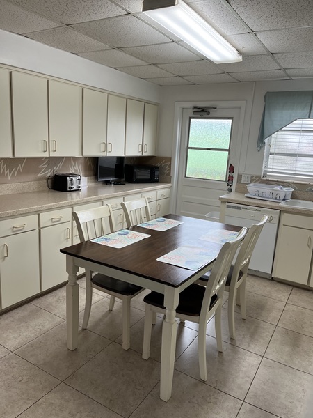 Eat-in Kitchen with dining table and chairs, plenty of cabinet space