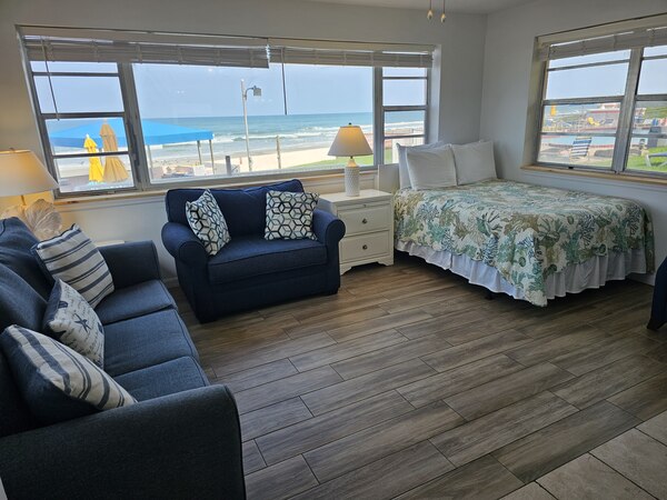 Room 29 living room oceanfront views looking south, double bed, queen sleeper sofa